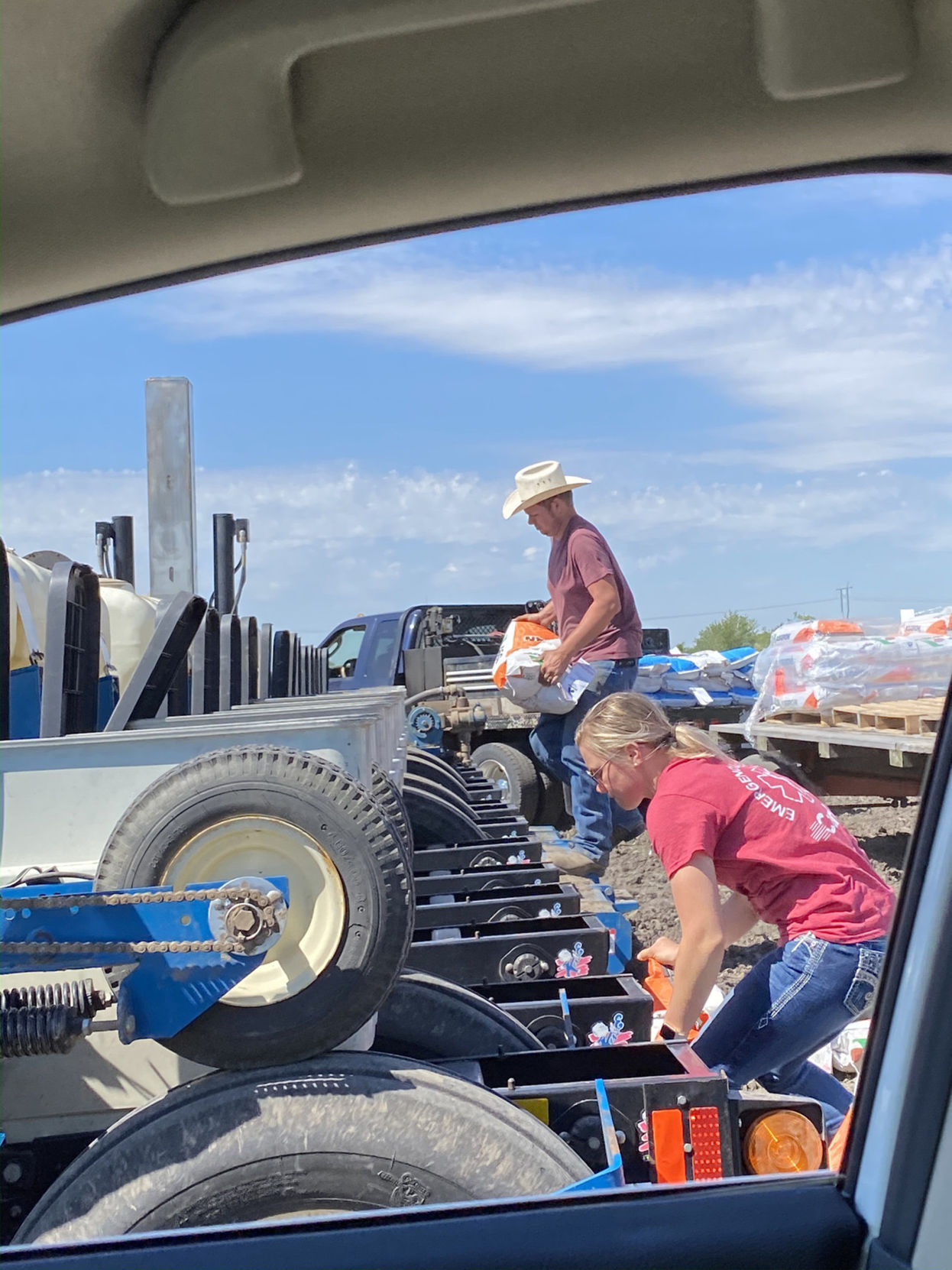Johanna and Jake Ziegler load planter.jpg
